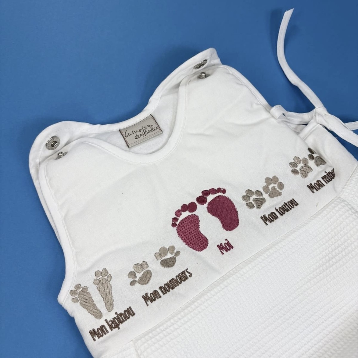 Śpiworek do spania dla niemowlaka różowy 60cm Stópki, Poyet | Dadum